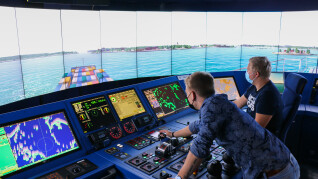 Students working in a simulator